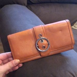 Coach — Orange Skinny Wallet in good condition!